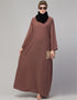 Trendy Abaya made from Nida fabric with a flared hem for a feminine touch In Color Light brown